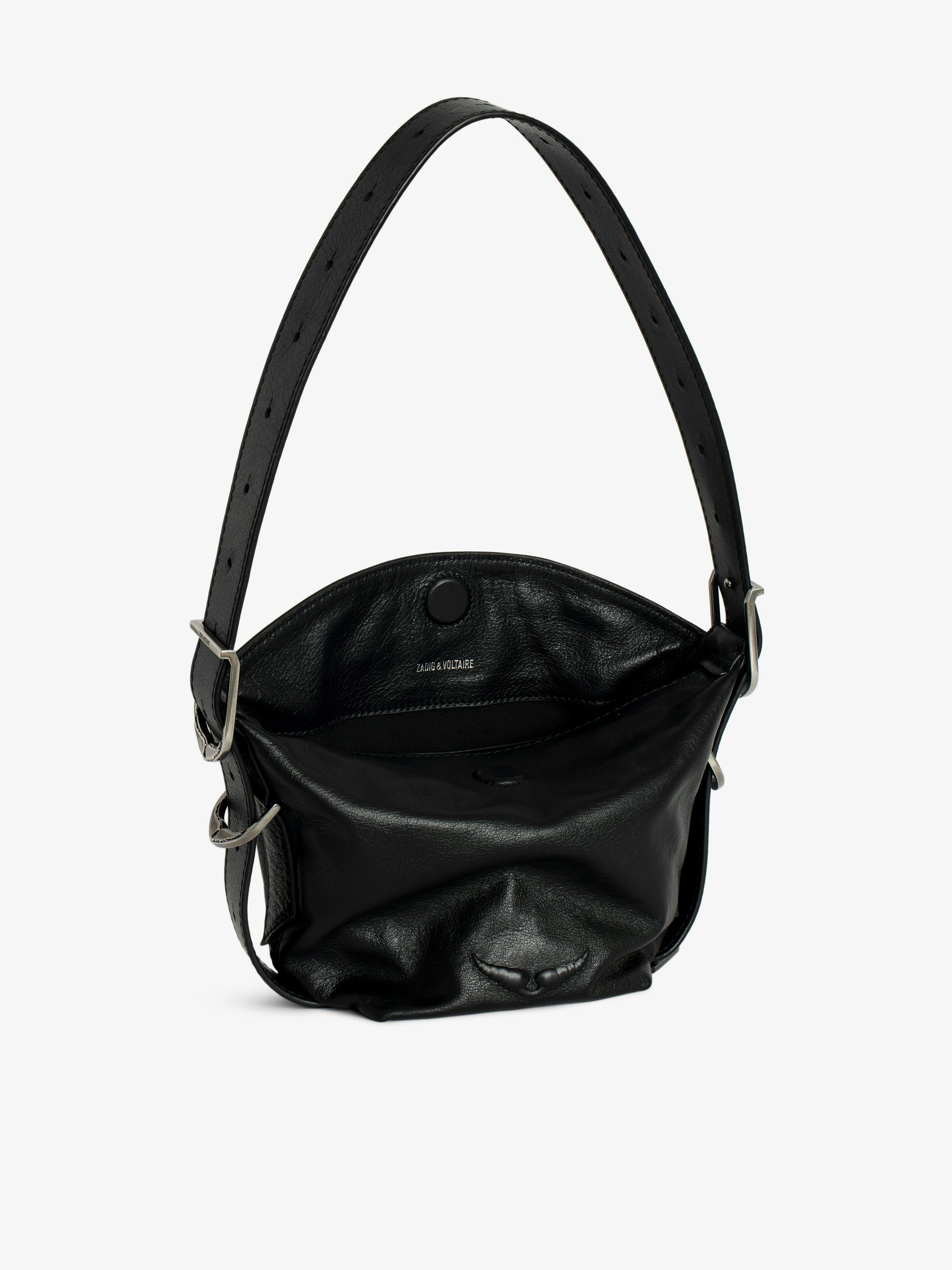 Baby Jane Bag - Leather bag with adjustable shoulder strap and debossed wing signature.